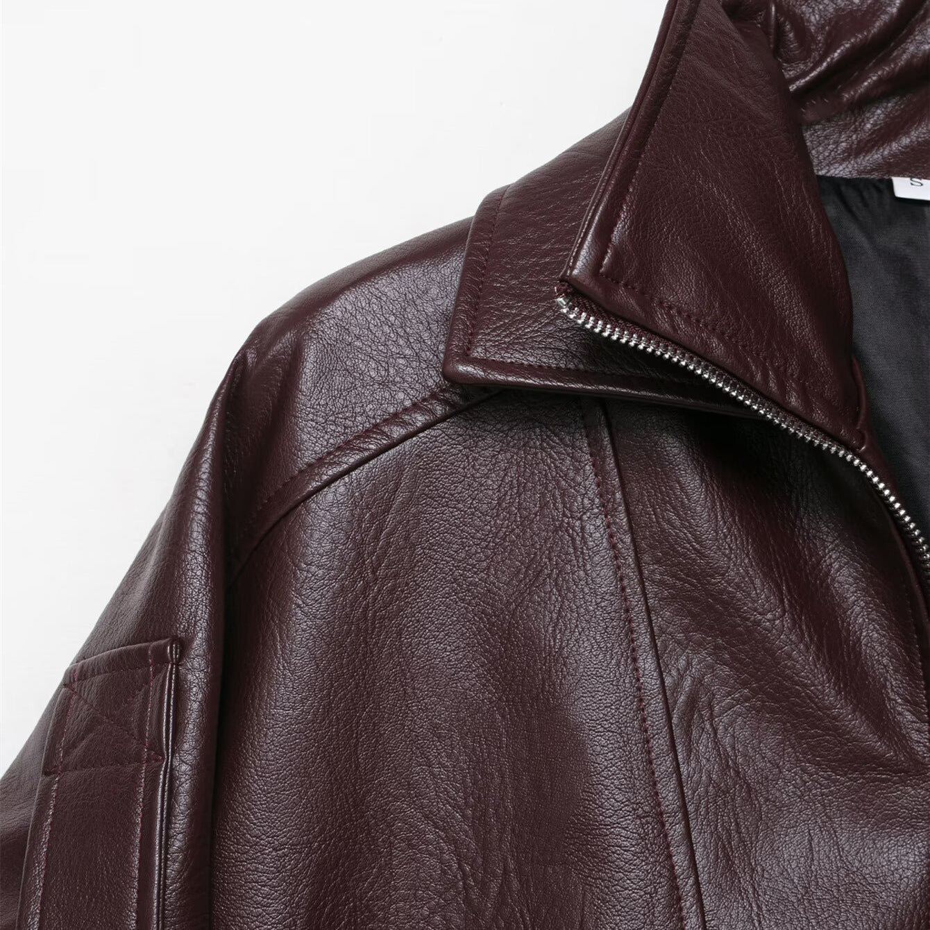 Burgundy biker jacket with belt and high collar
