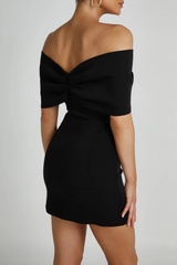 Black off-the-shoulder mini dress with bow detail