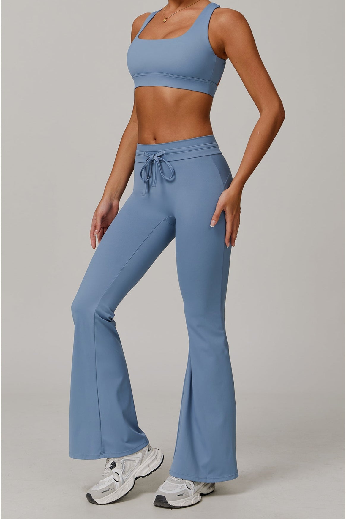 Sports set with vest, top and pants