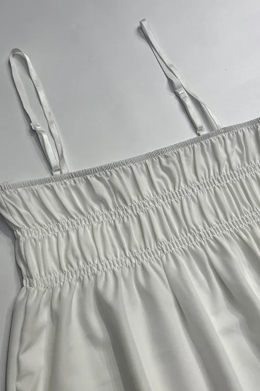 White sleeveless long dress with open back