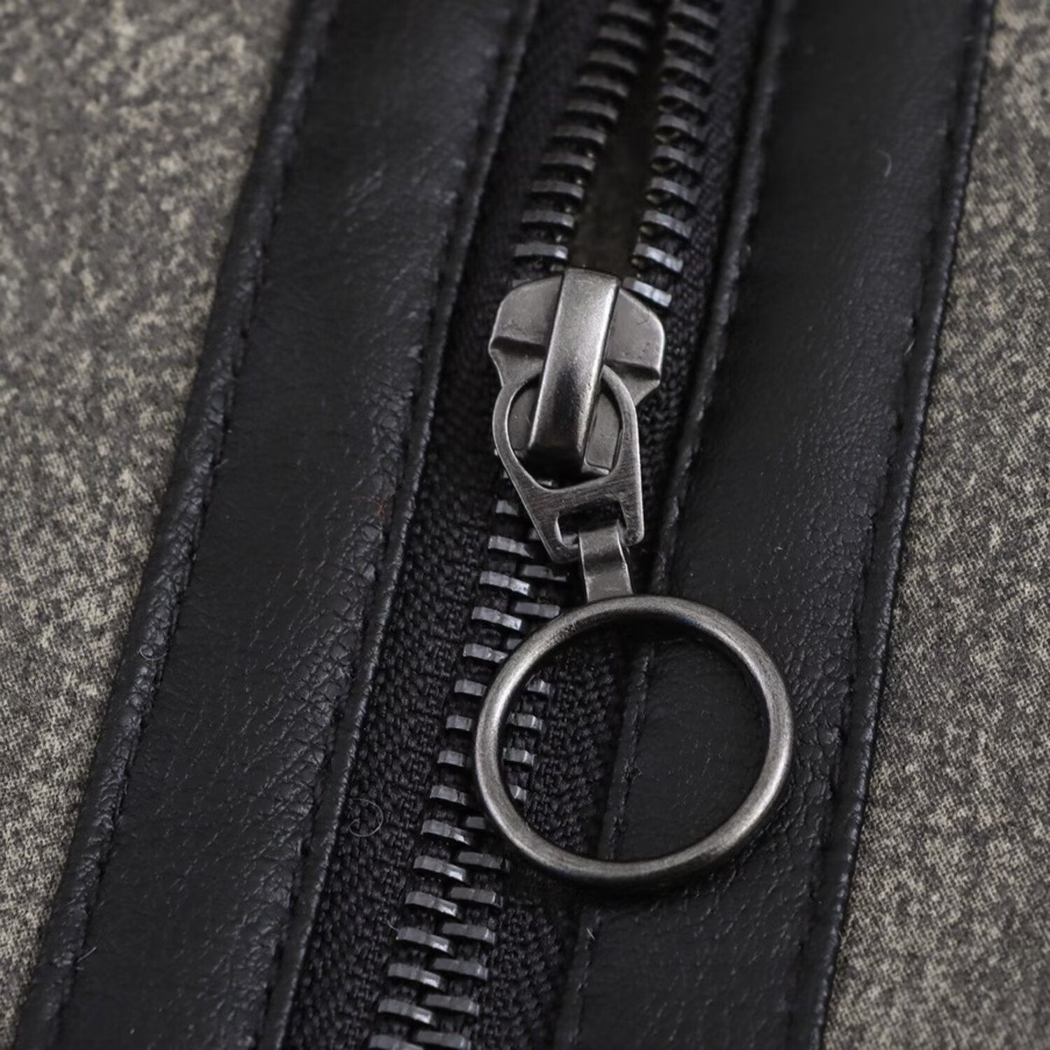 Short jacket with stand-up collar and buckle details