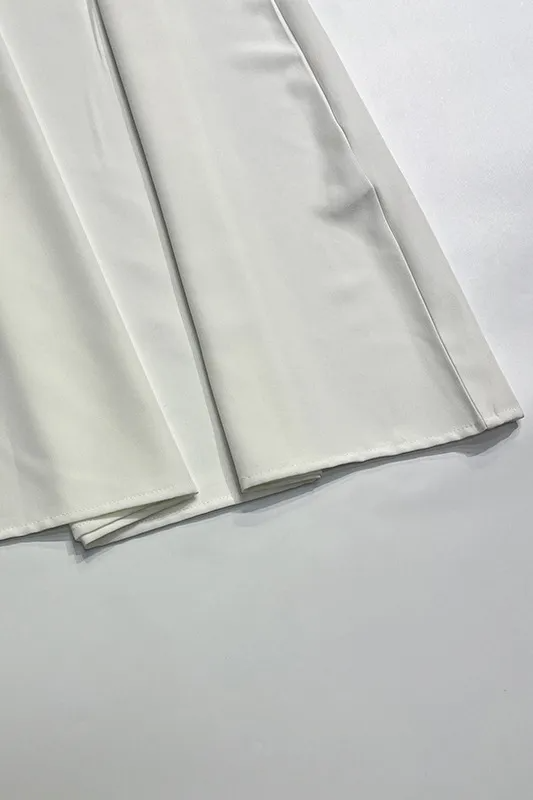 White sleeveless long dress with open back