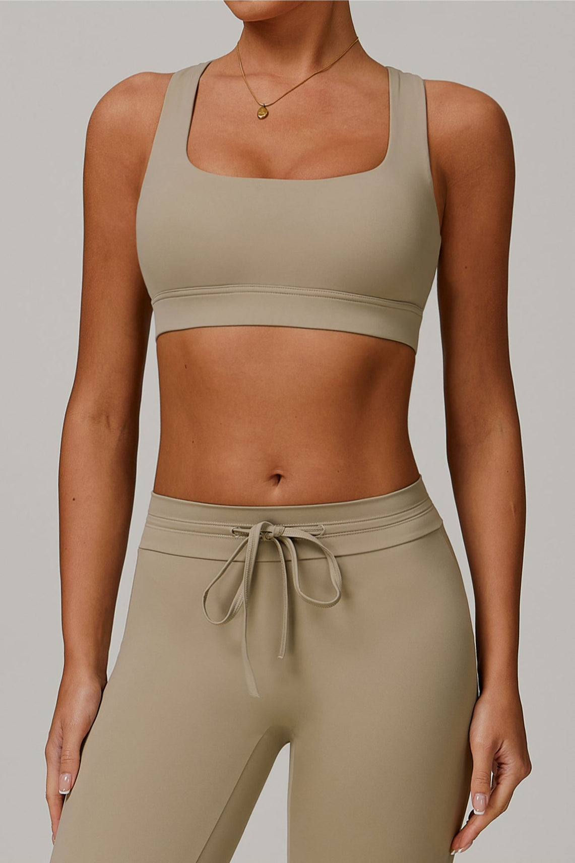 Sports set with vest, top and pants