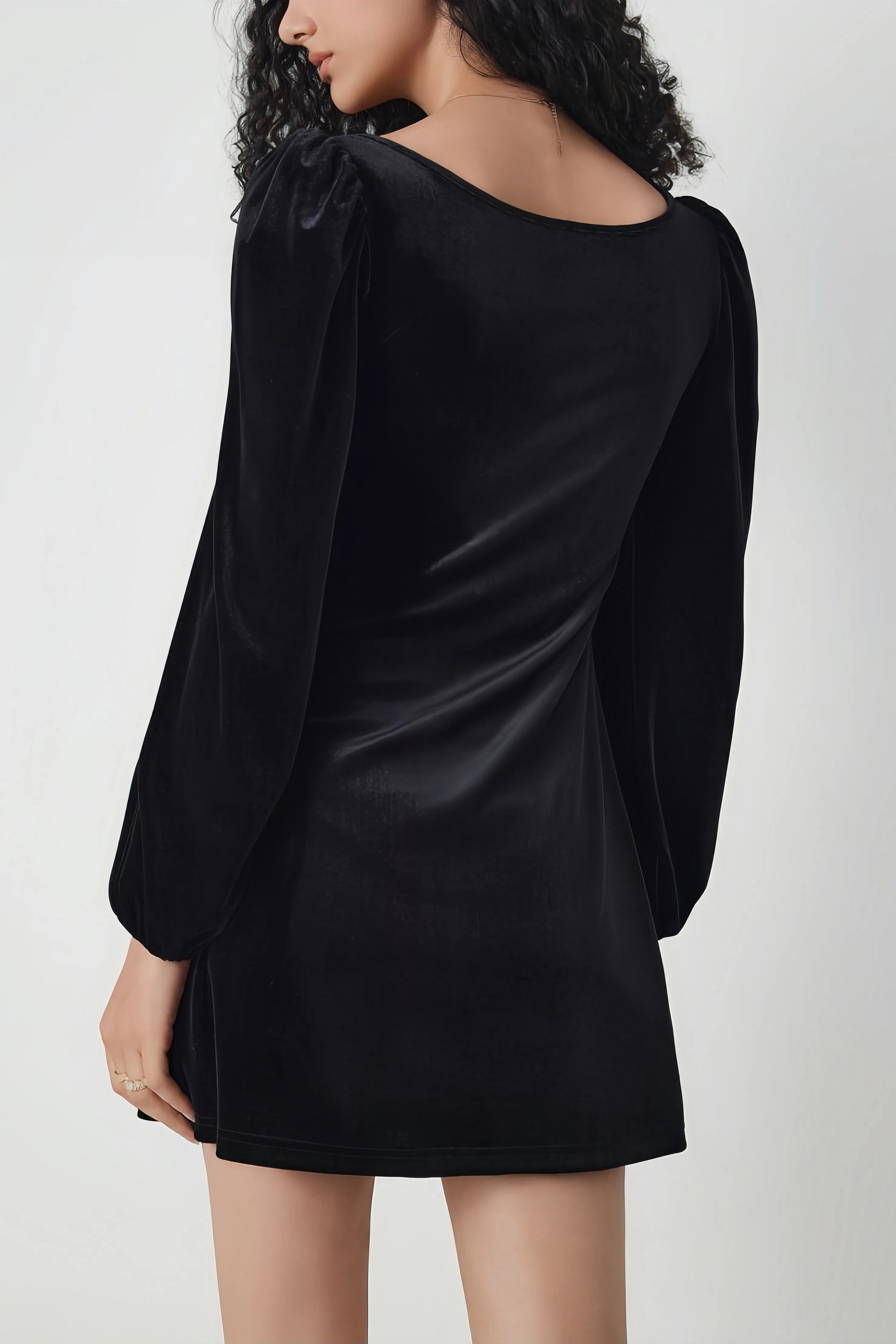 Black velvet dress with long puff sleeves