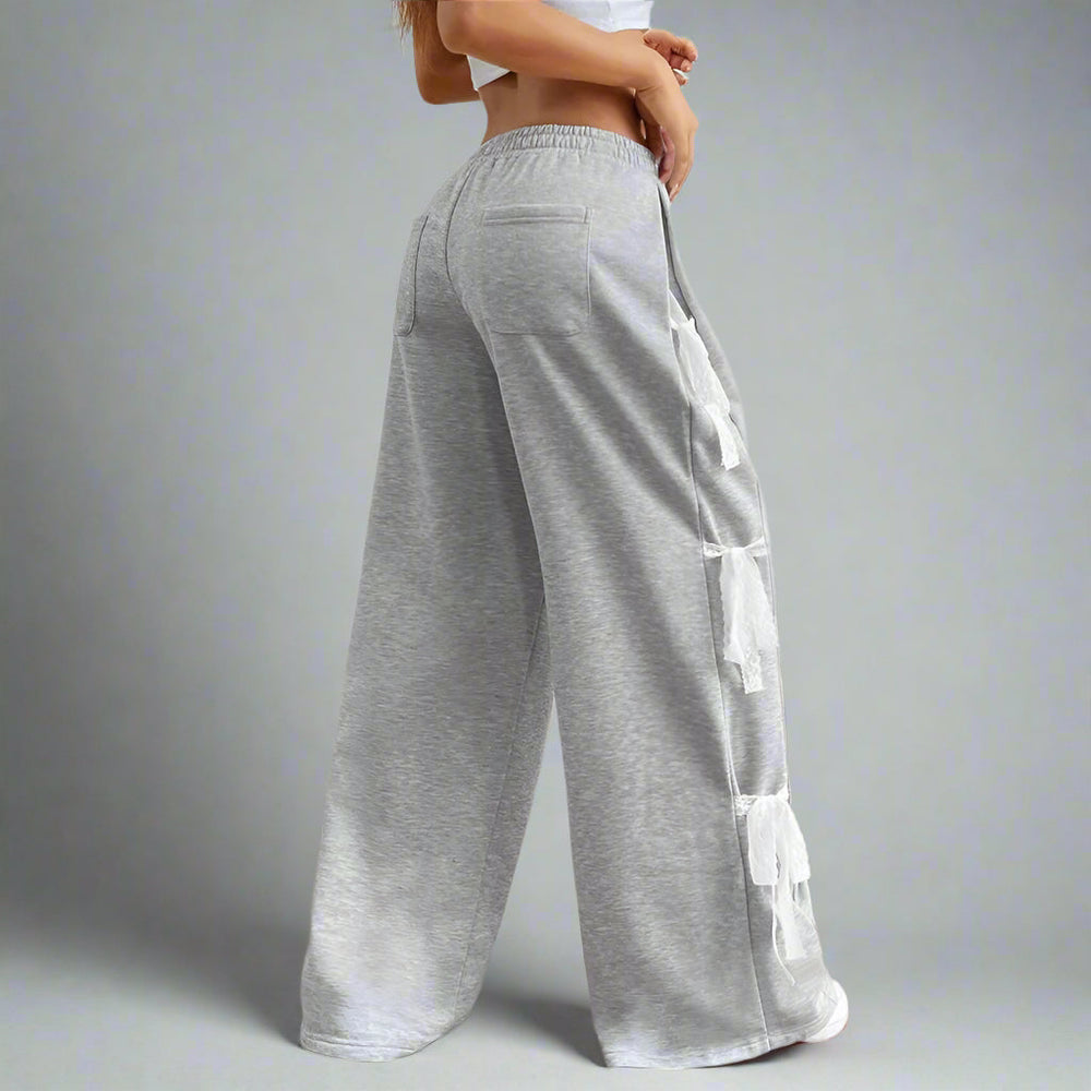 Vida byxor med rosett i spets