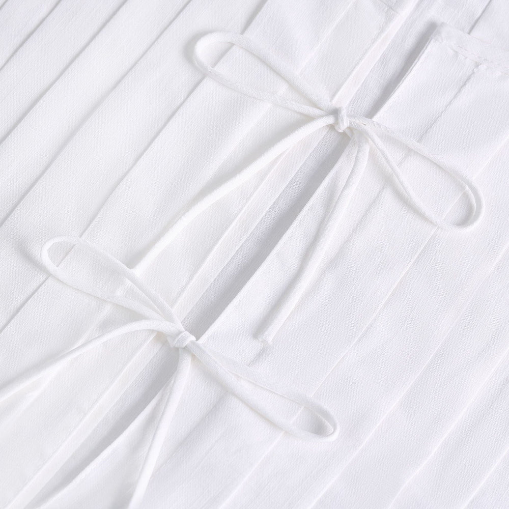 Subtil väst i bomull med snörning