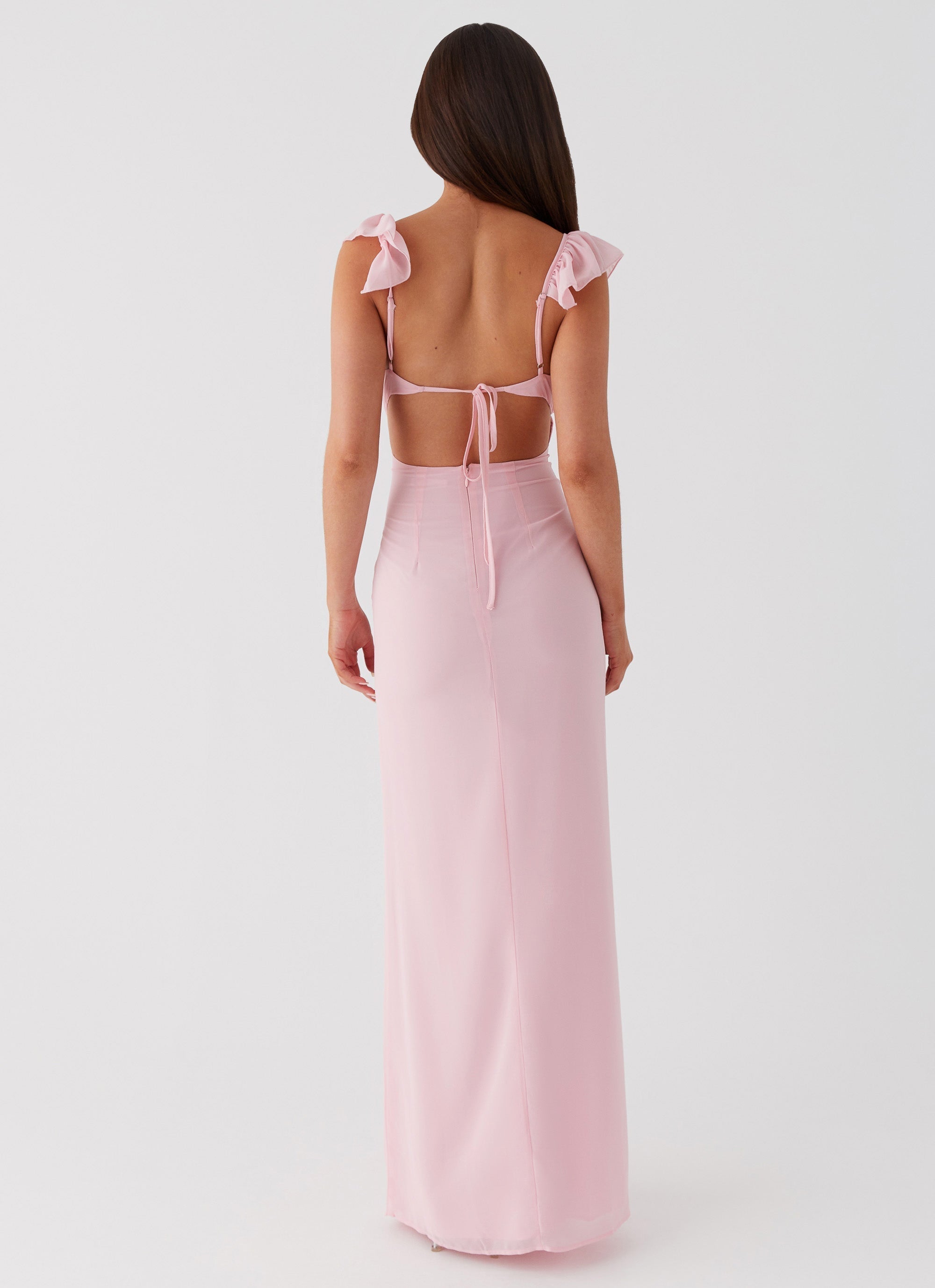 Light pink long dress with ruffles and plunging neckline