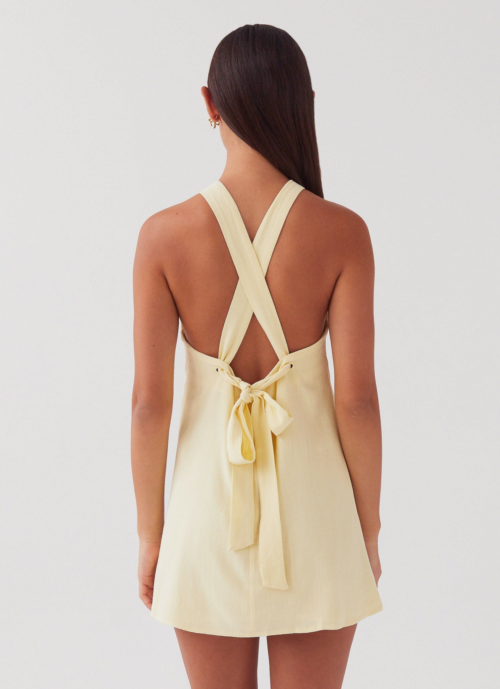 Light yellow backless mini dress