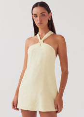 Light yellow backless mini dress