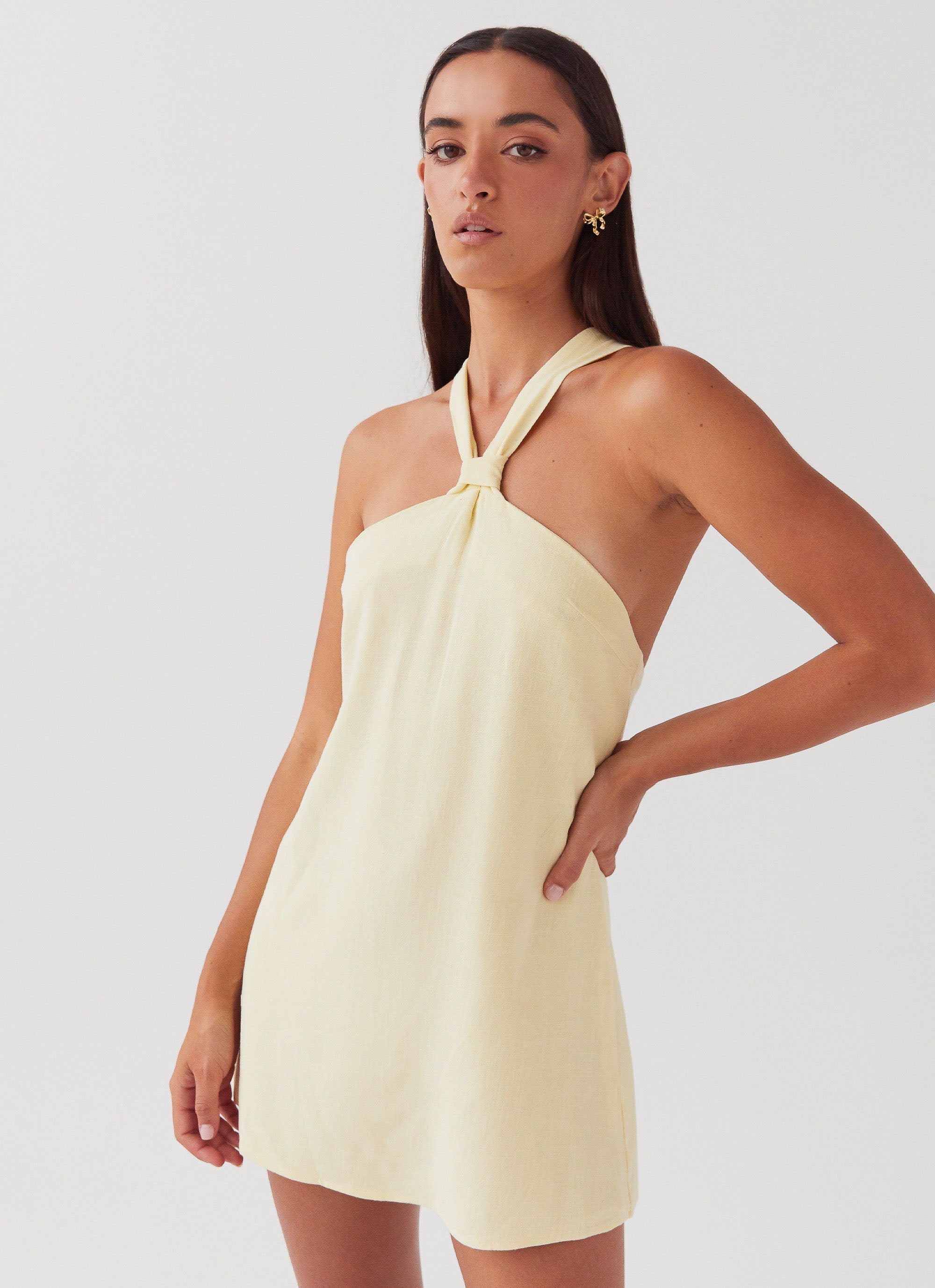 Light yellow backless mini dress
