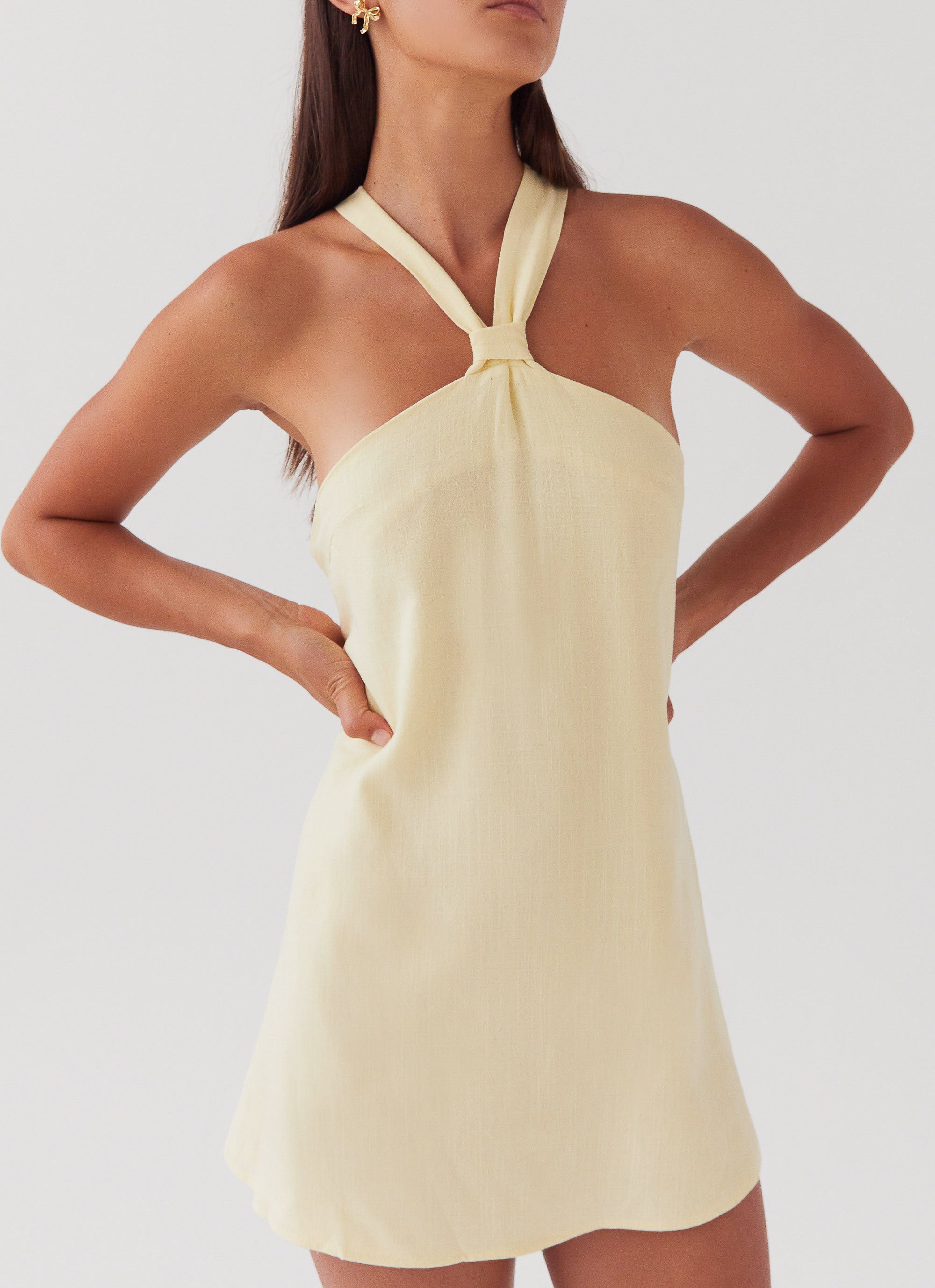Light yellow backless mini dress