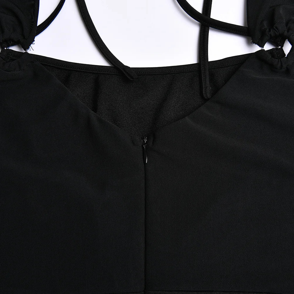 Tight rygglös långärmad miniklänning