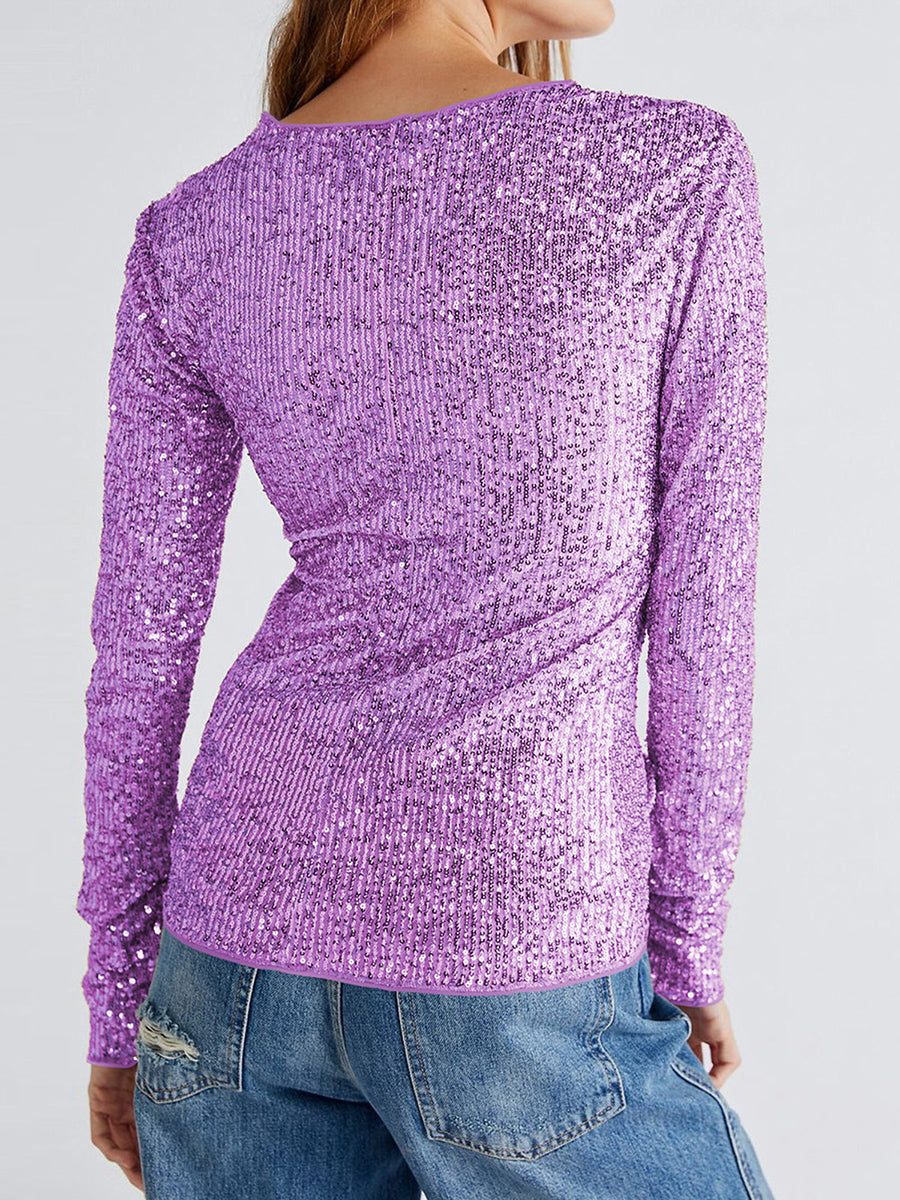 Glittrig långärmad skjorta med rund hals