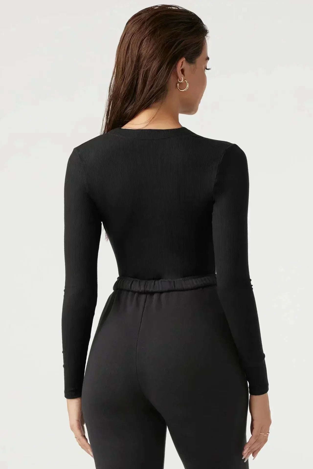 Bodysuit med dragkedja och långa ärmar