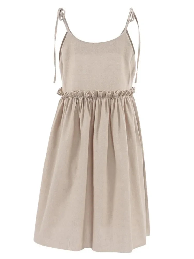 Sleeveless mini dress with bow ties