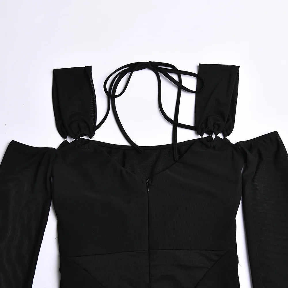 Tight rygglös långärmad miniklänning