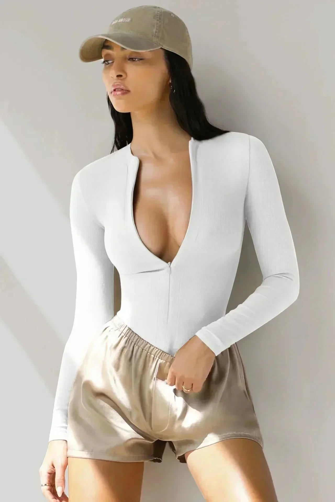 Bodysuit med dragkedja och långa ärmar