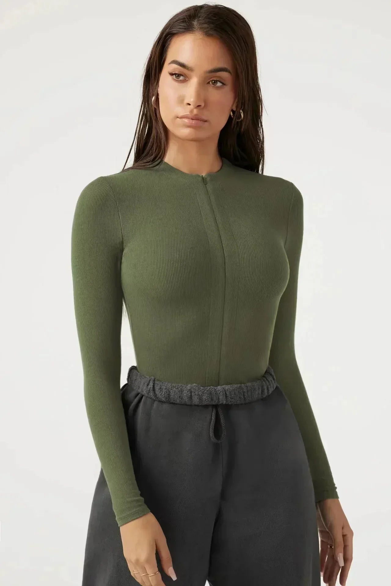 Bodysuit med dragkedja och långa ärmar