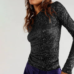 Glittrig långärmad skjorta med rund hals