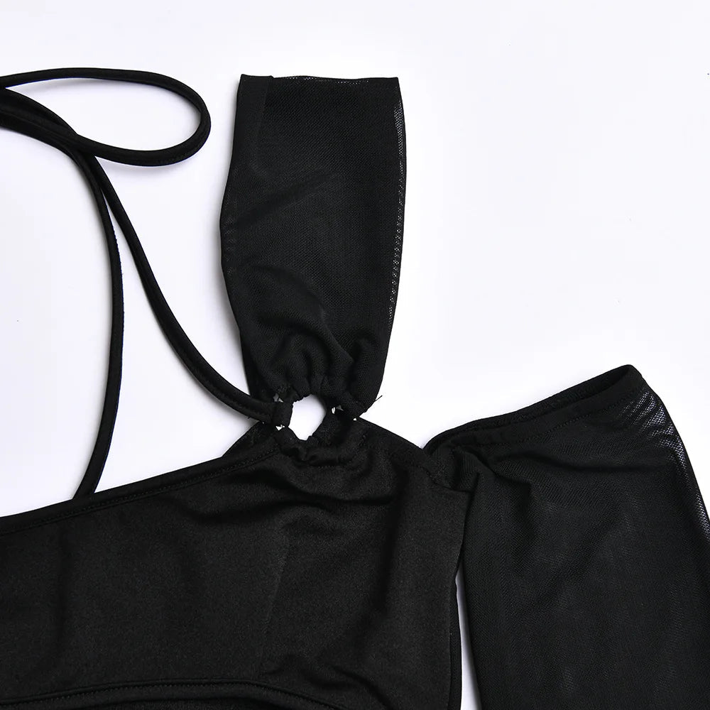 Tight rygglös långärmad miniklänning