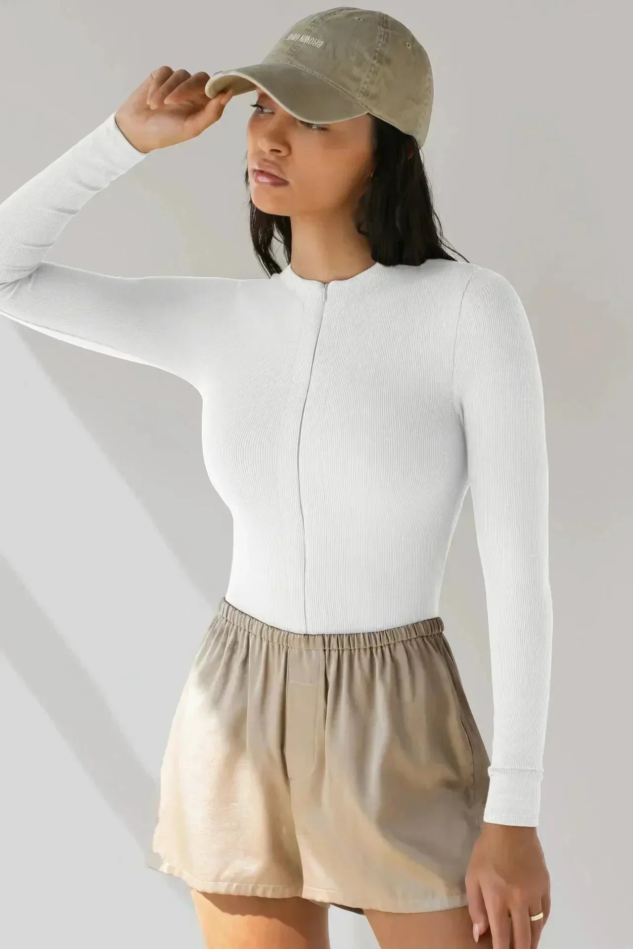 Bodysuit med dragkedja och långa ärmar