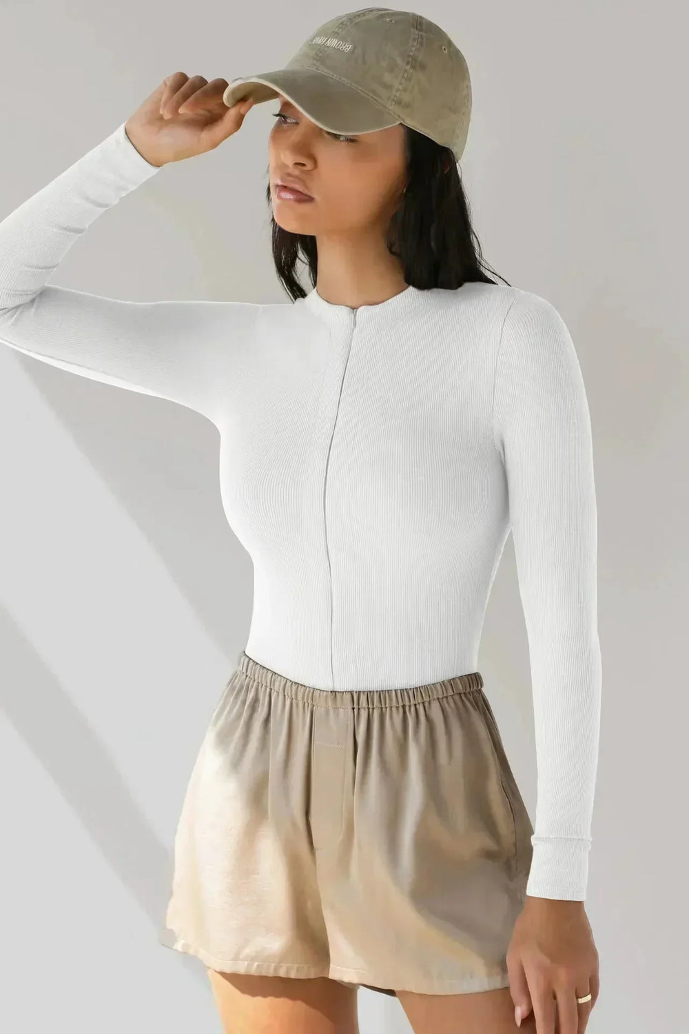 Bodysuit med dragkedja och långa ärmar