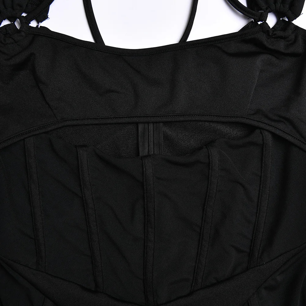 Tight rygglös långärmad miniklänning