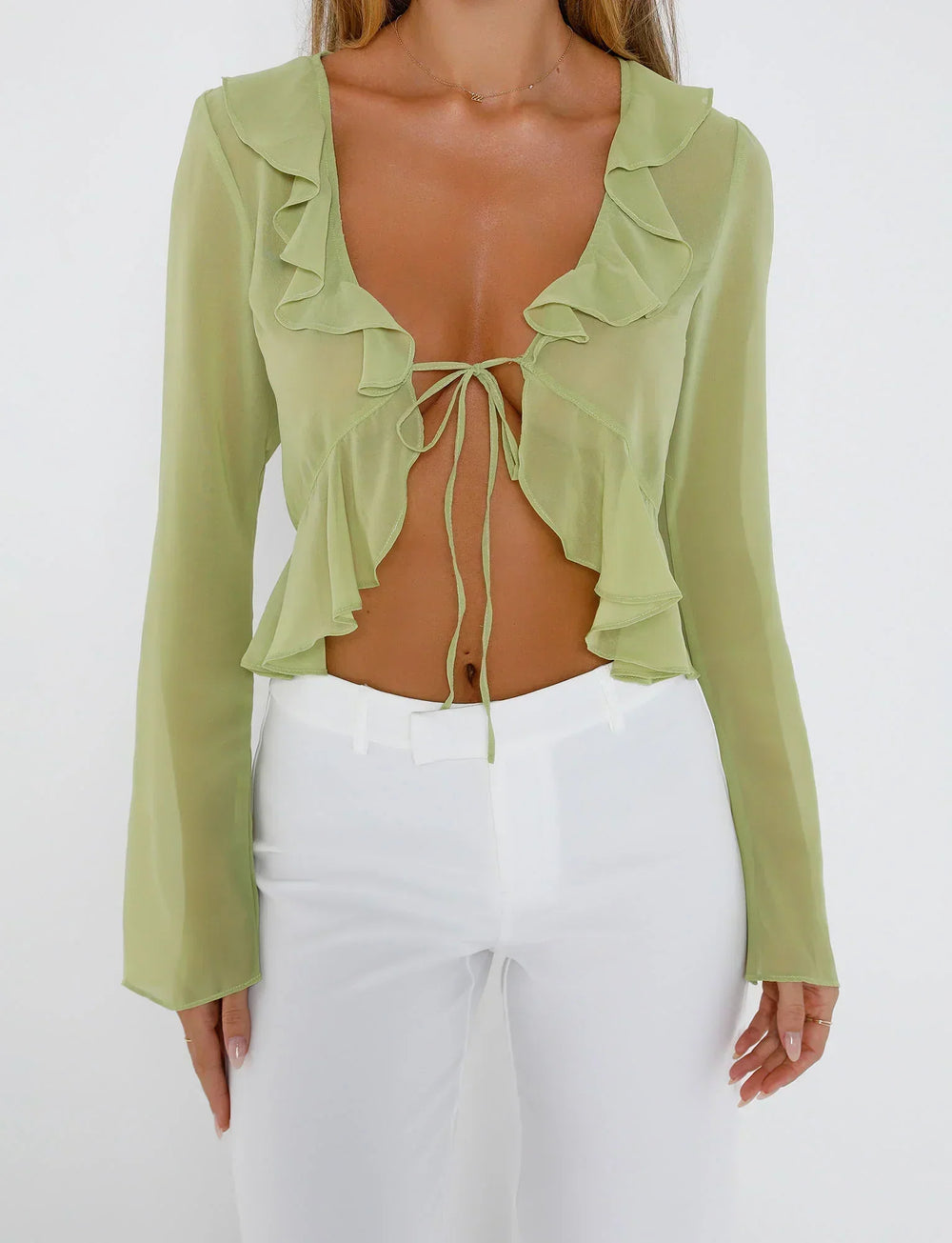 Grön topp med spets framtill