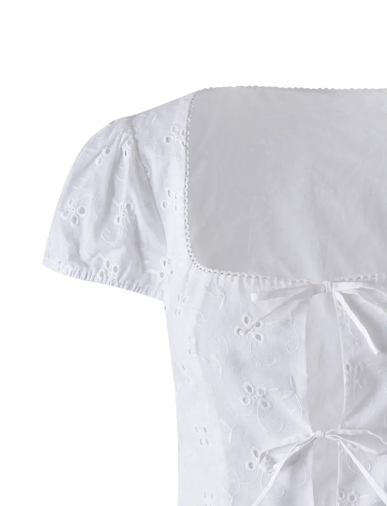 Vit vintagetopp med korta ärmar och minikjol