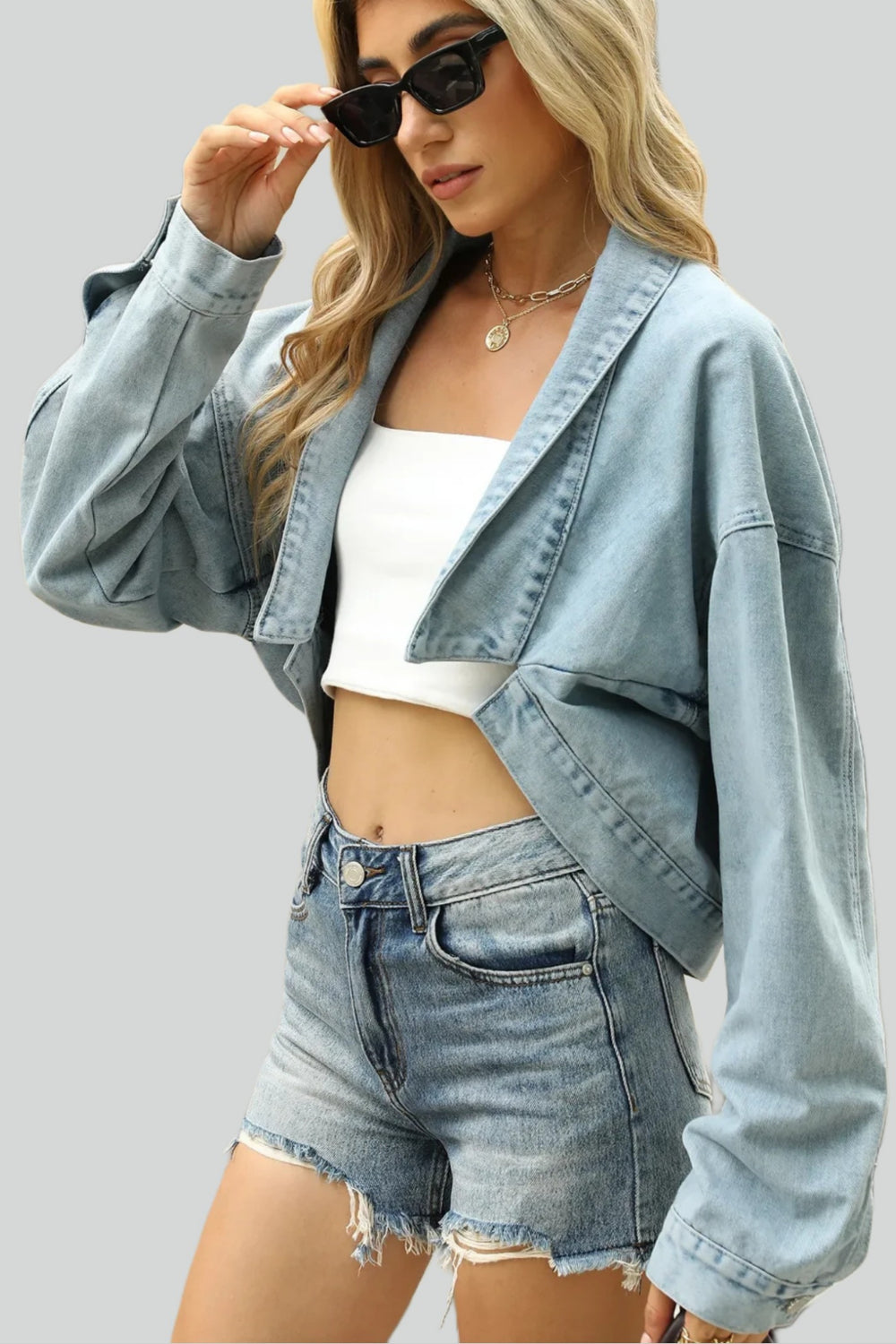 Short denim jacket with studs