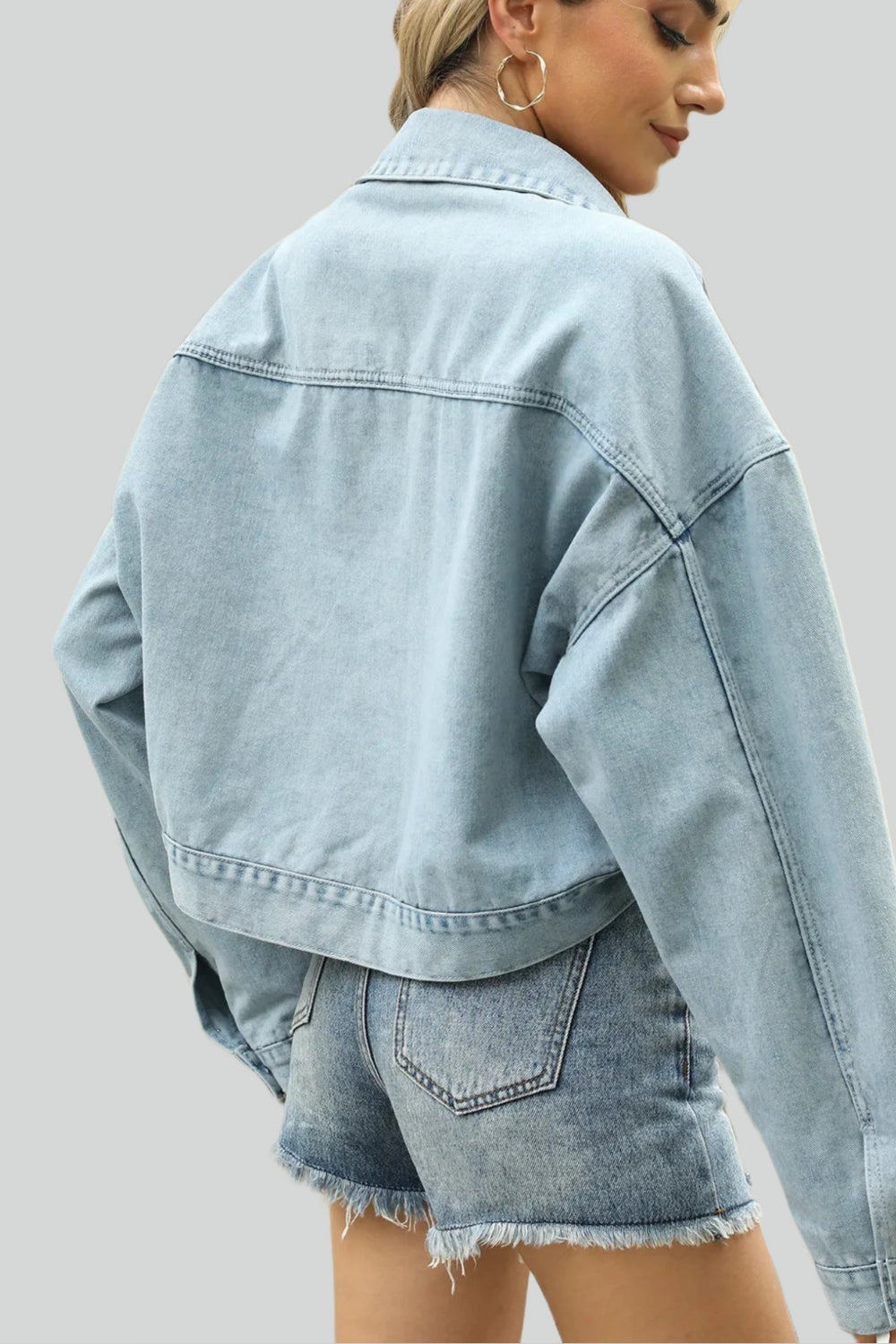 Short denim jacket with studs