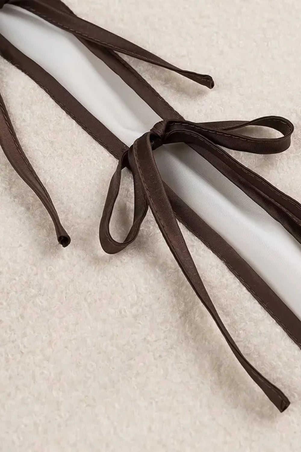 Short white jacket with contrasting piping