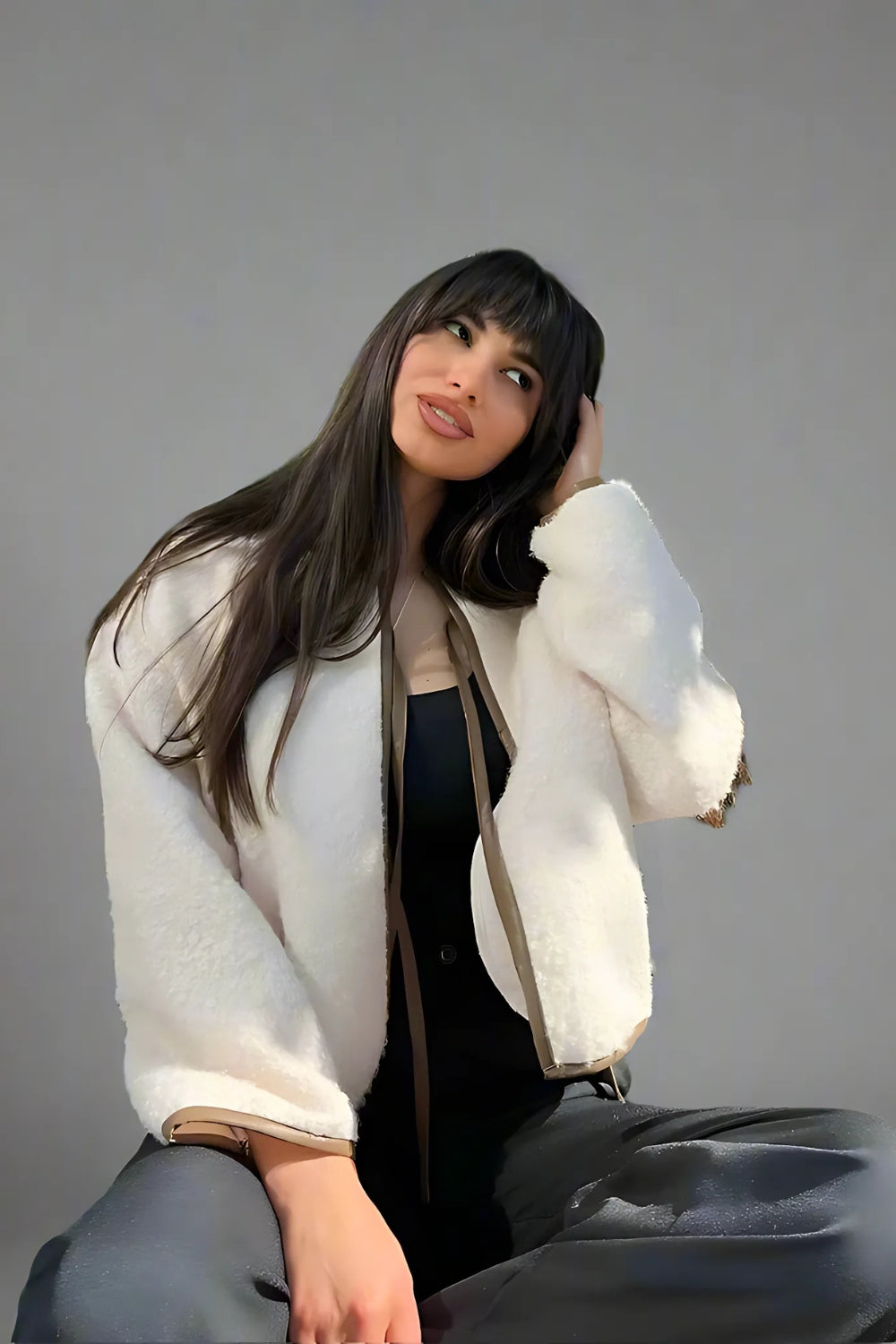 Short white jacket with contrasting piping