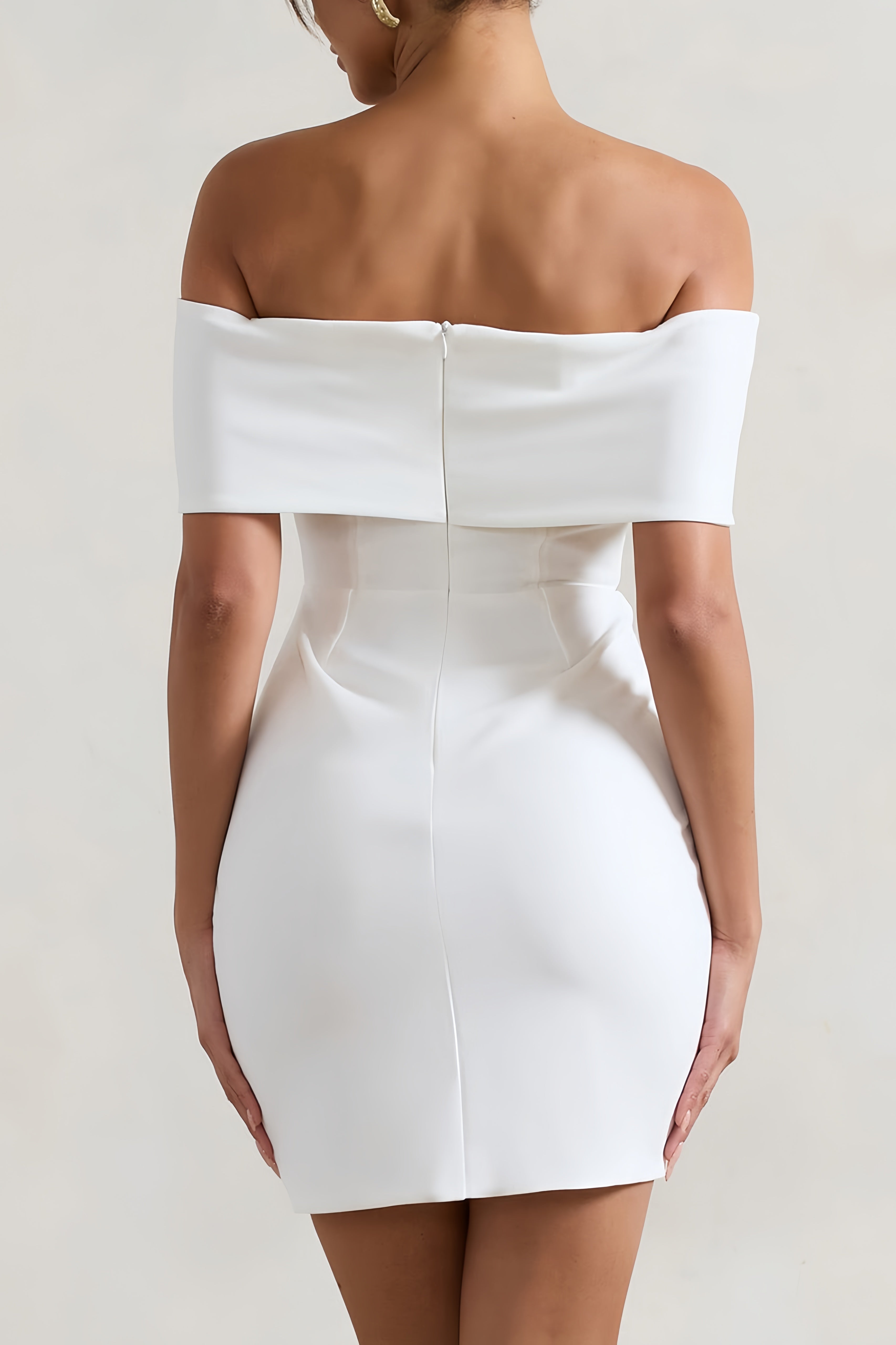 White off-the-shoulder mini dress with knot detail and keyhole