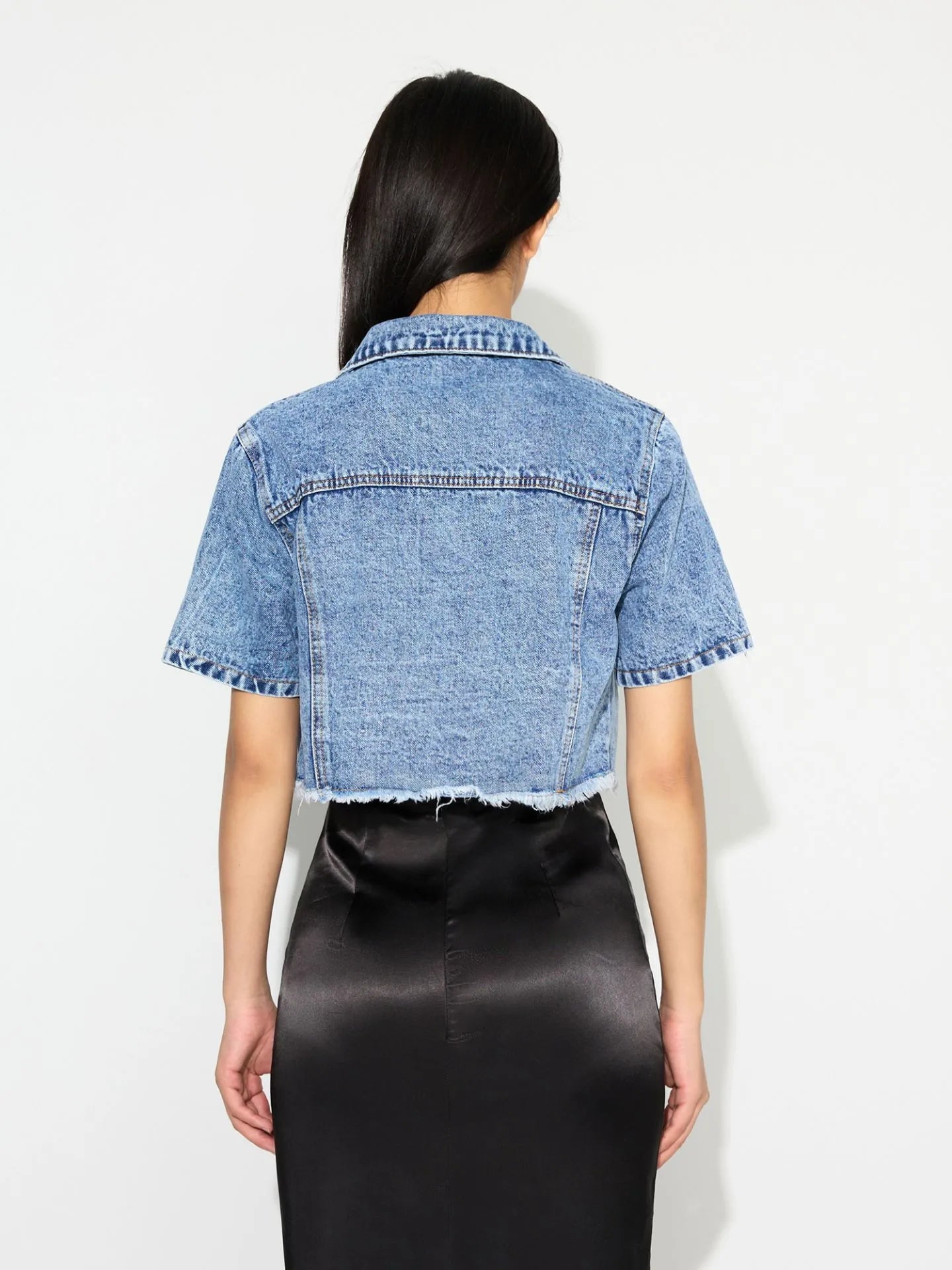 Light blue cropped denim jacket with short sleeves