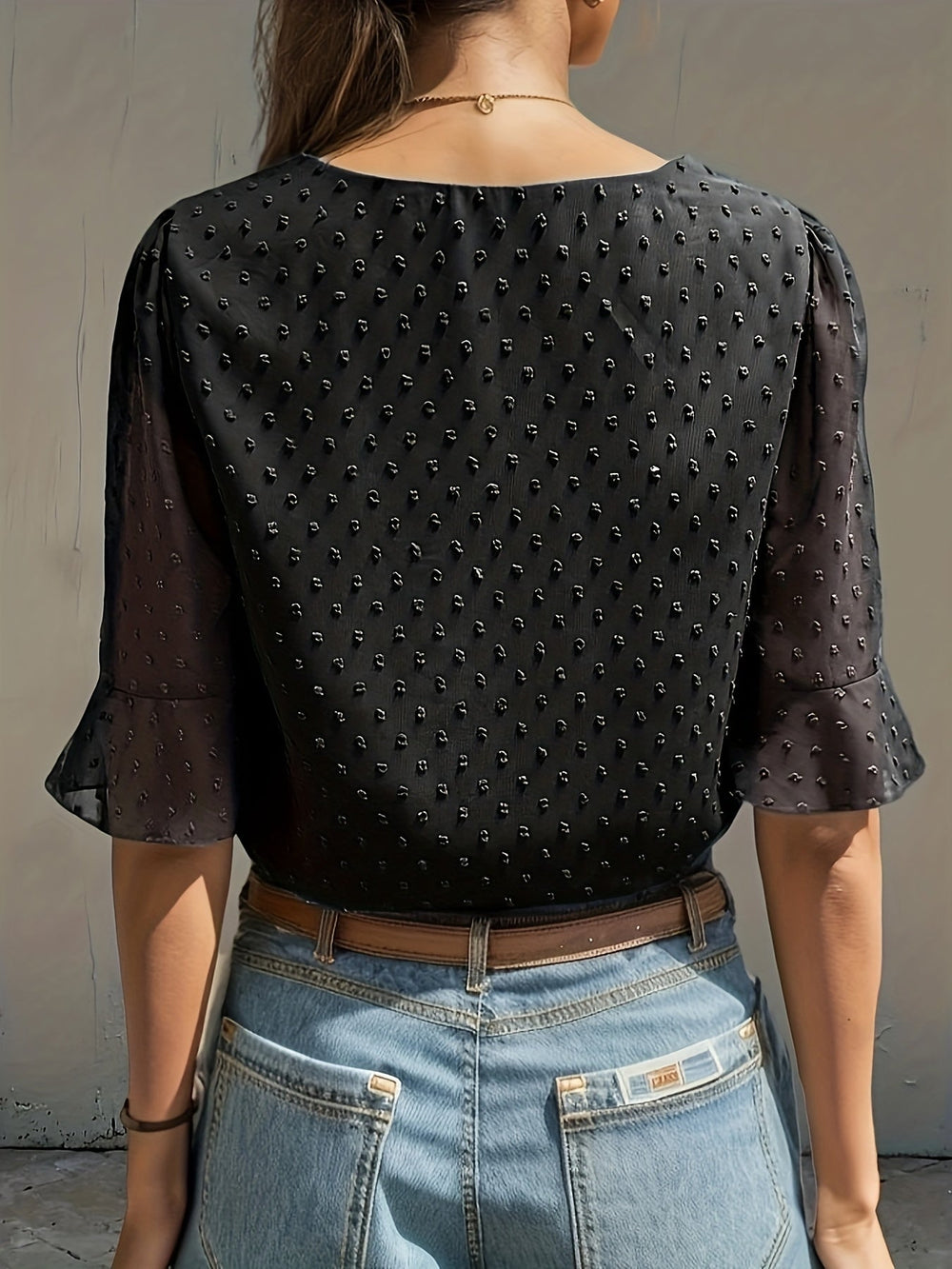 Lös blus med låg ärm