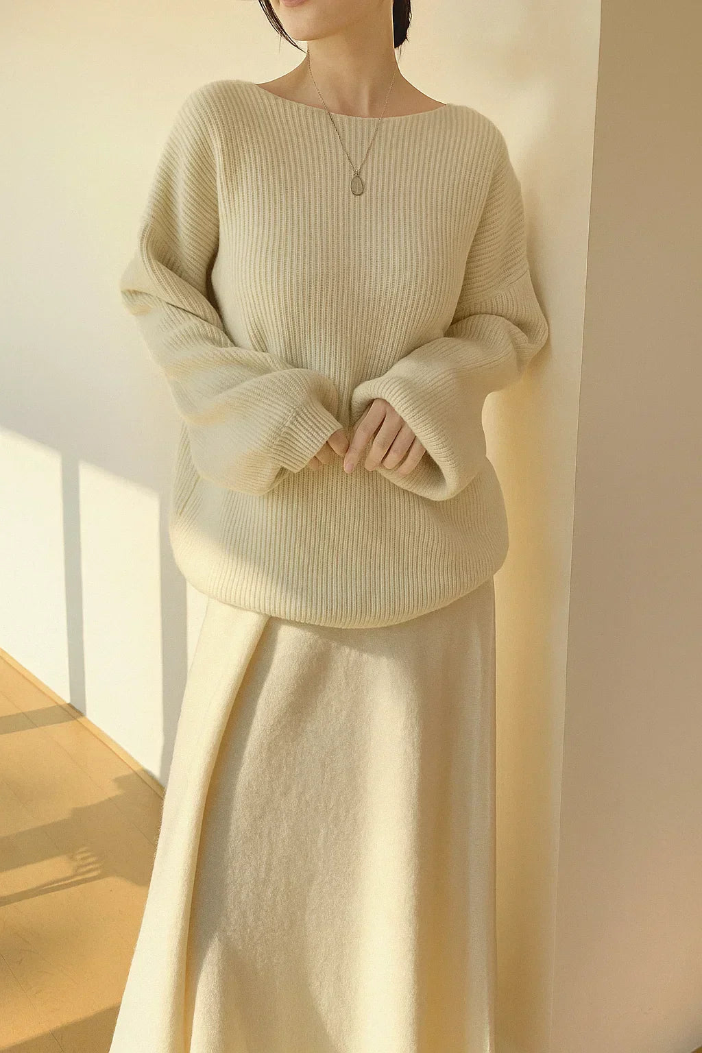 Knitted sweater and flared skirt set with ribbed structure