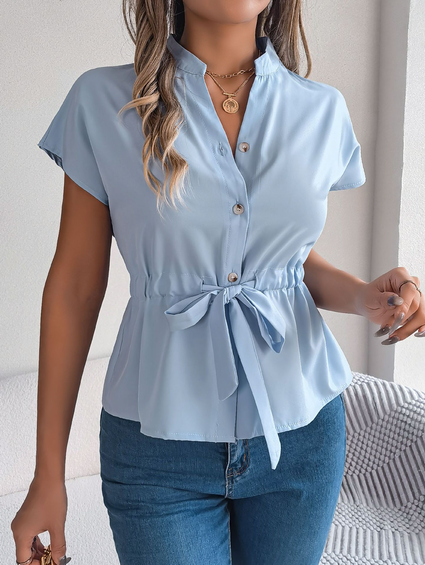 Kortärmad skjorta med knapp och dragsko