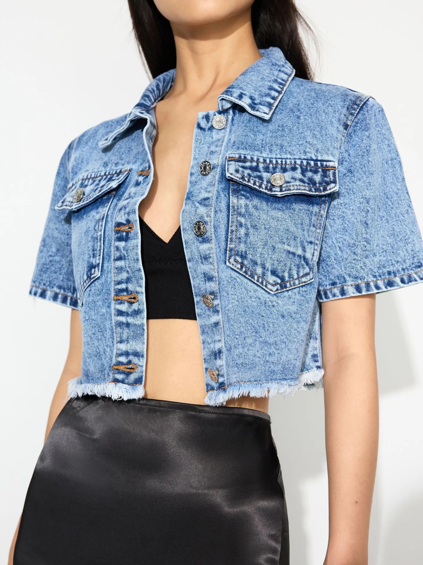 Light blue cropped denim jacket with short sleeves