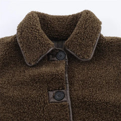 Brown teddy jacket with buttons and zipper pockets