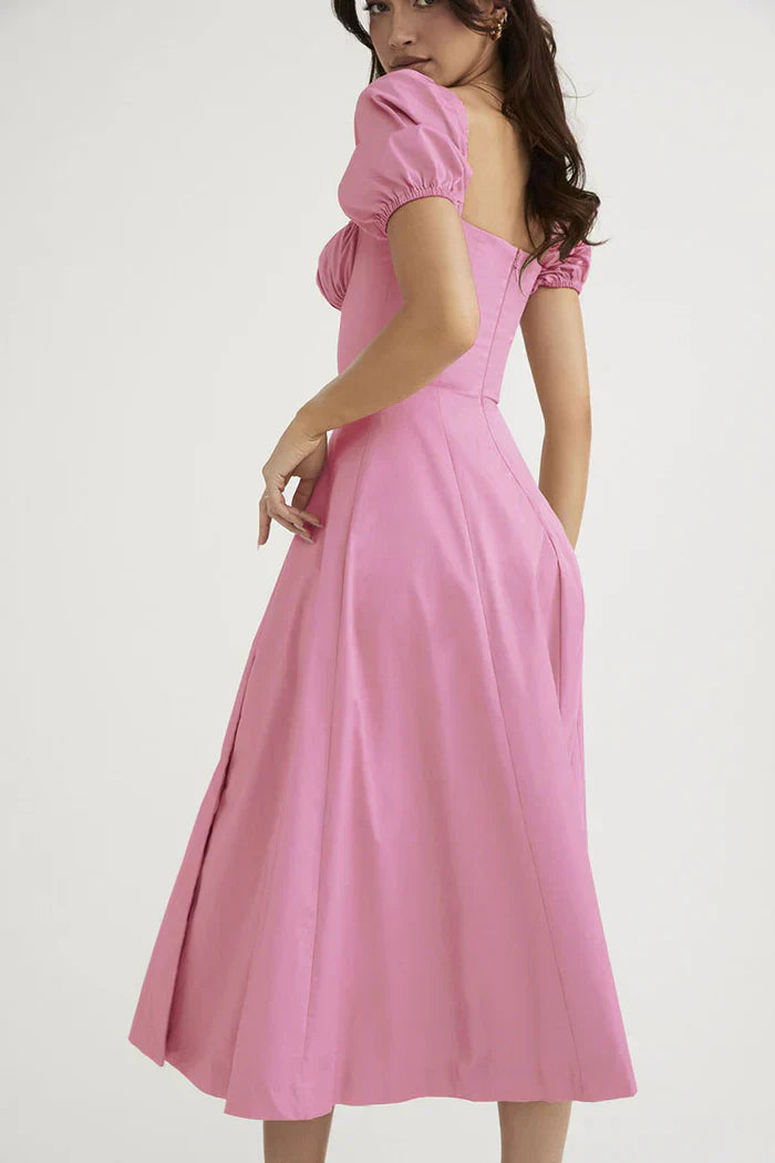 Pink midi dress with puffed sleeves
