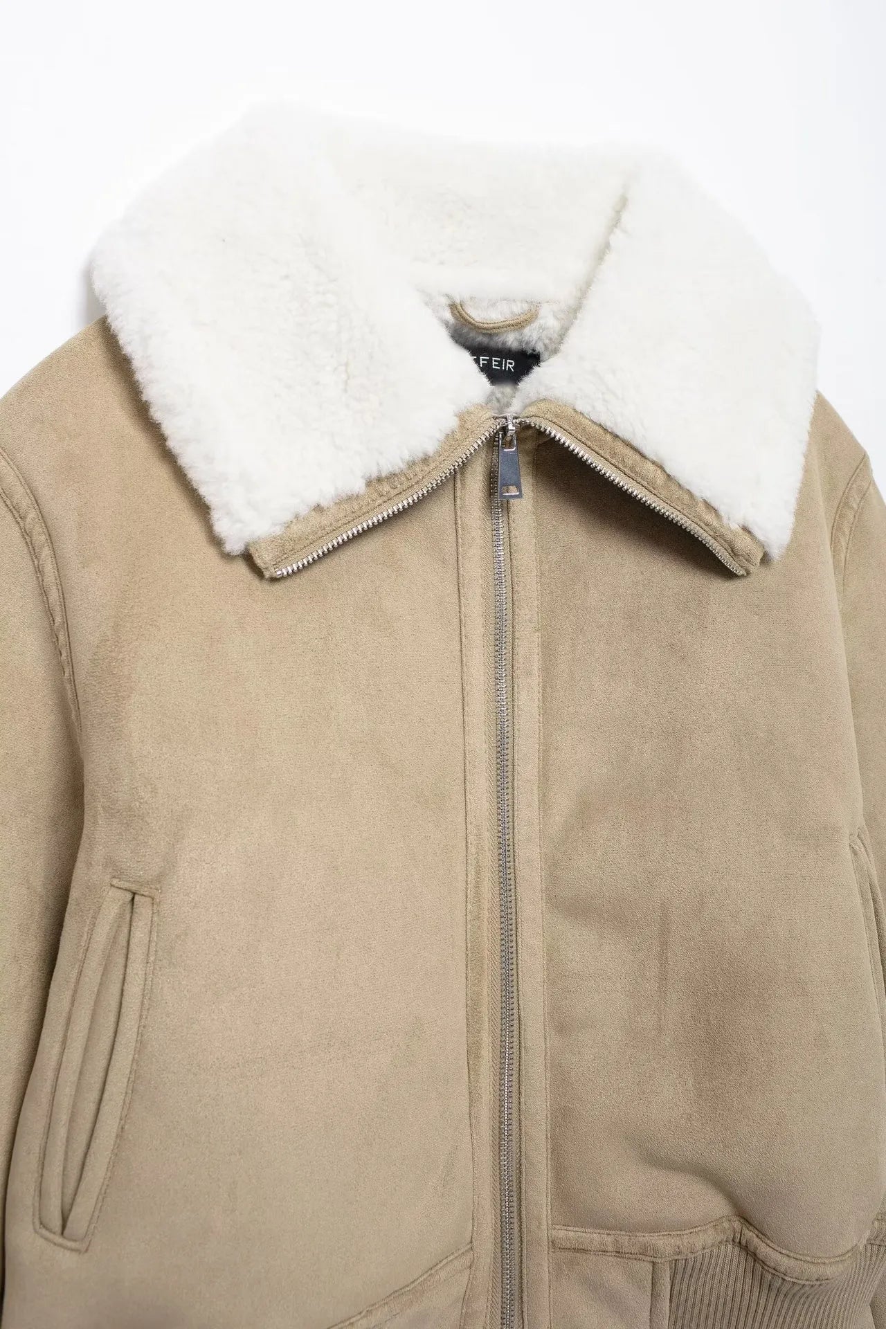 Dubbelsidig jacka med gängad fåll