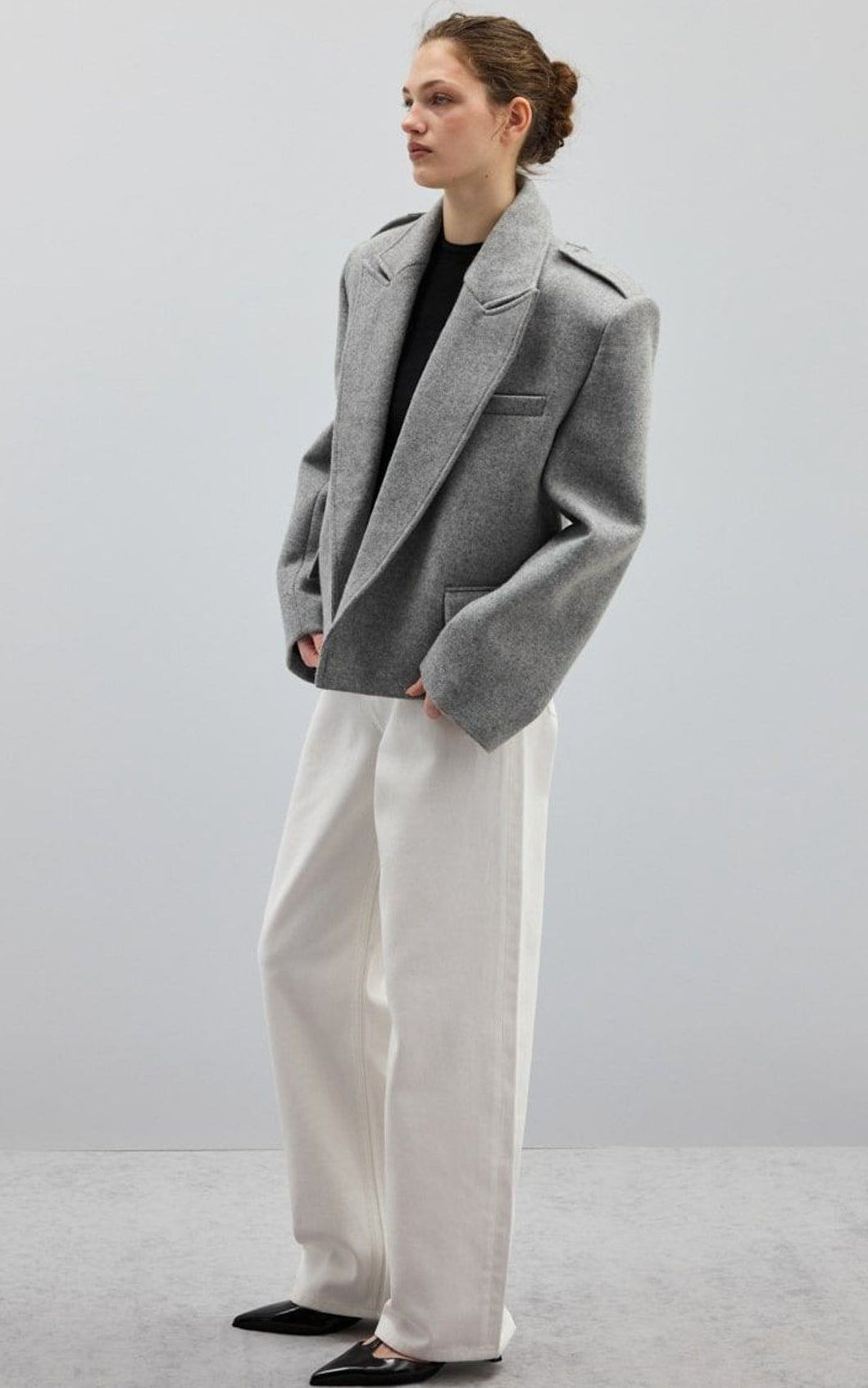 Gray short blazer with wide lapels and epaulettes