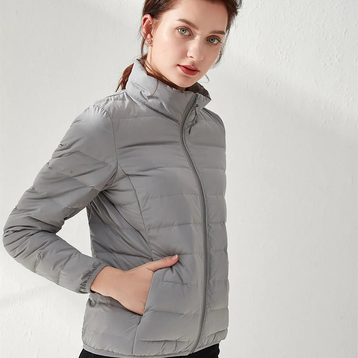 Lightweight puffer jacket with high collar and slim fit