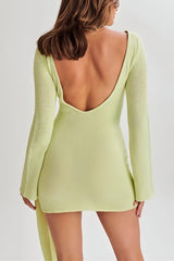 Light green mini dress with draped details