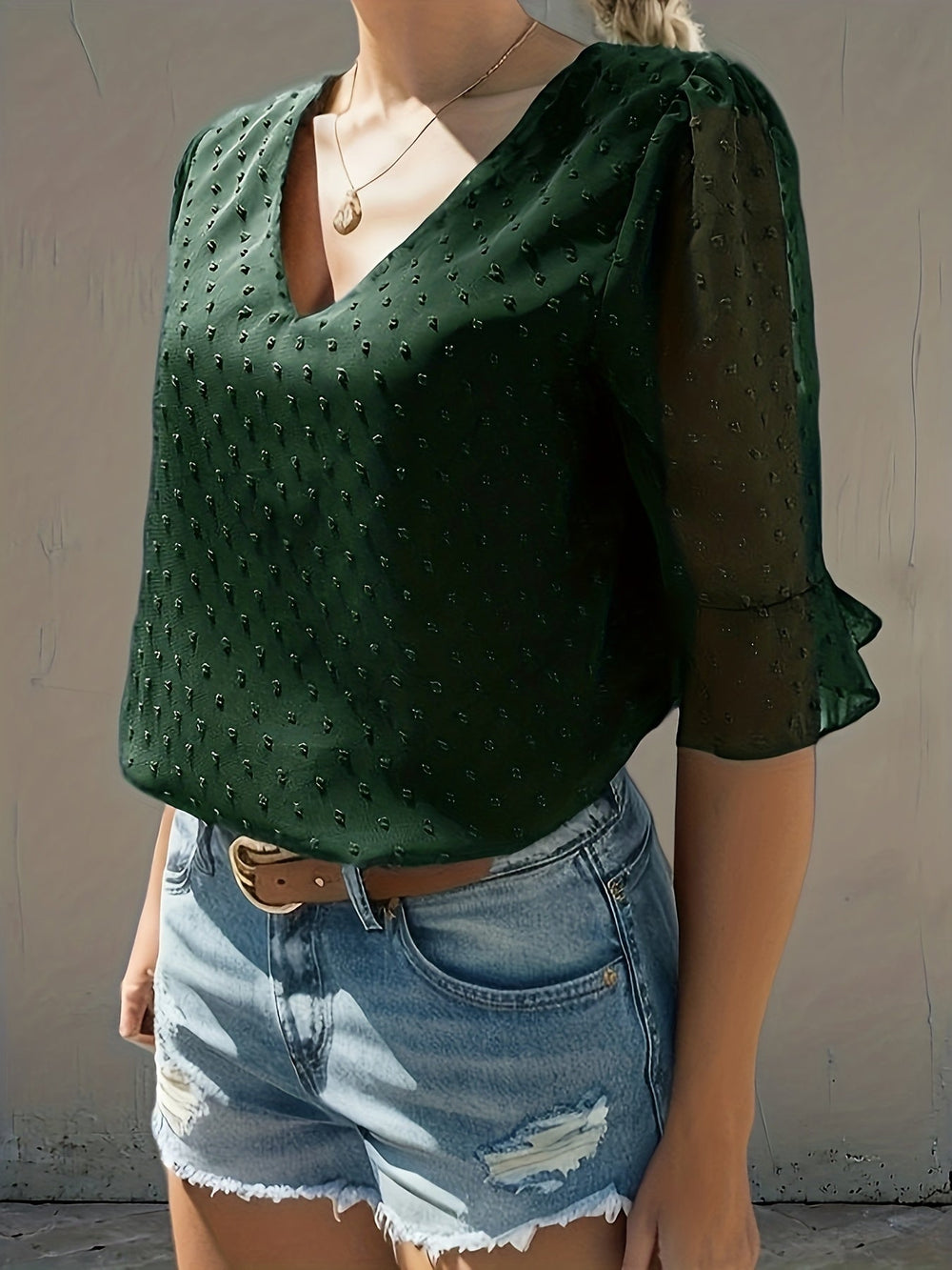 Lös blus med låg ärm