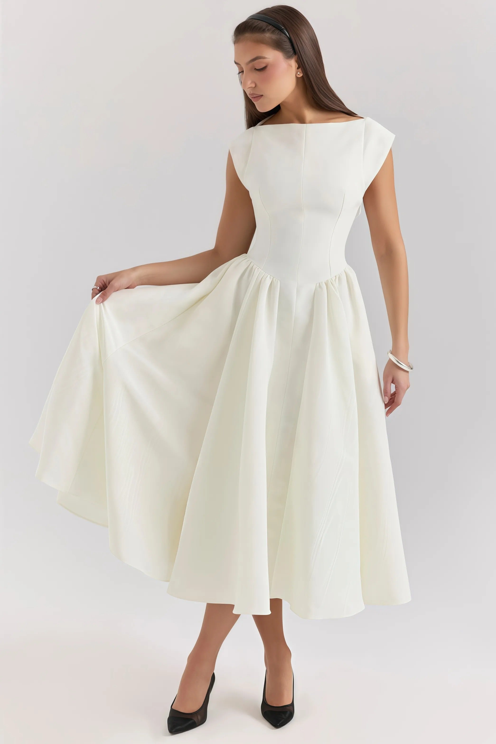 Elegant white midi dress with flared skirt