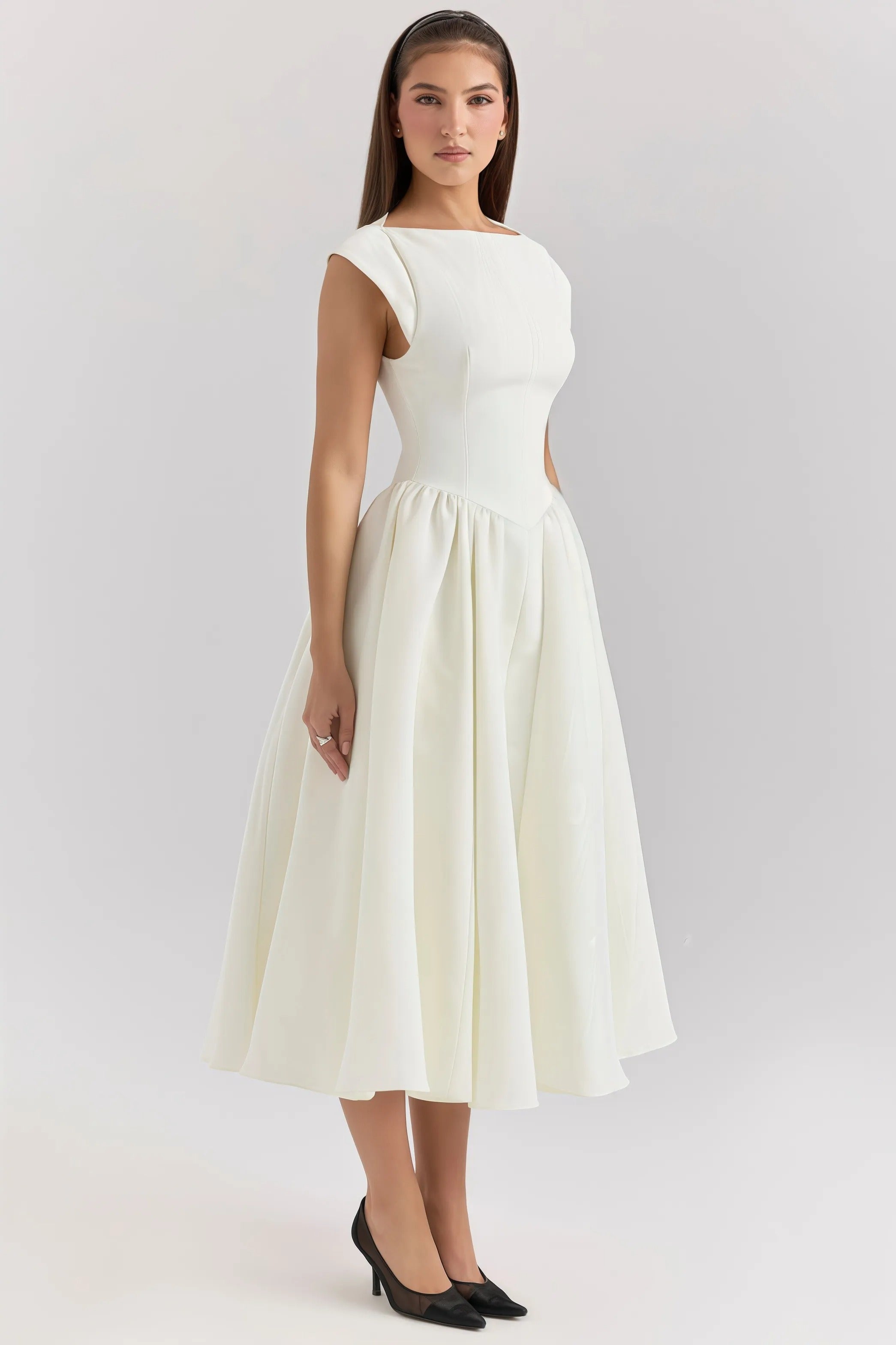 Elegant white midi dress with flared skirt