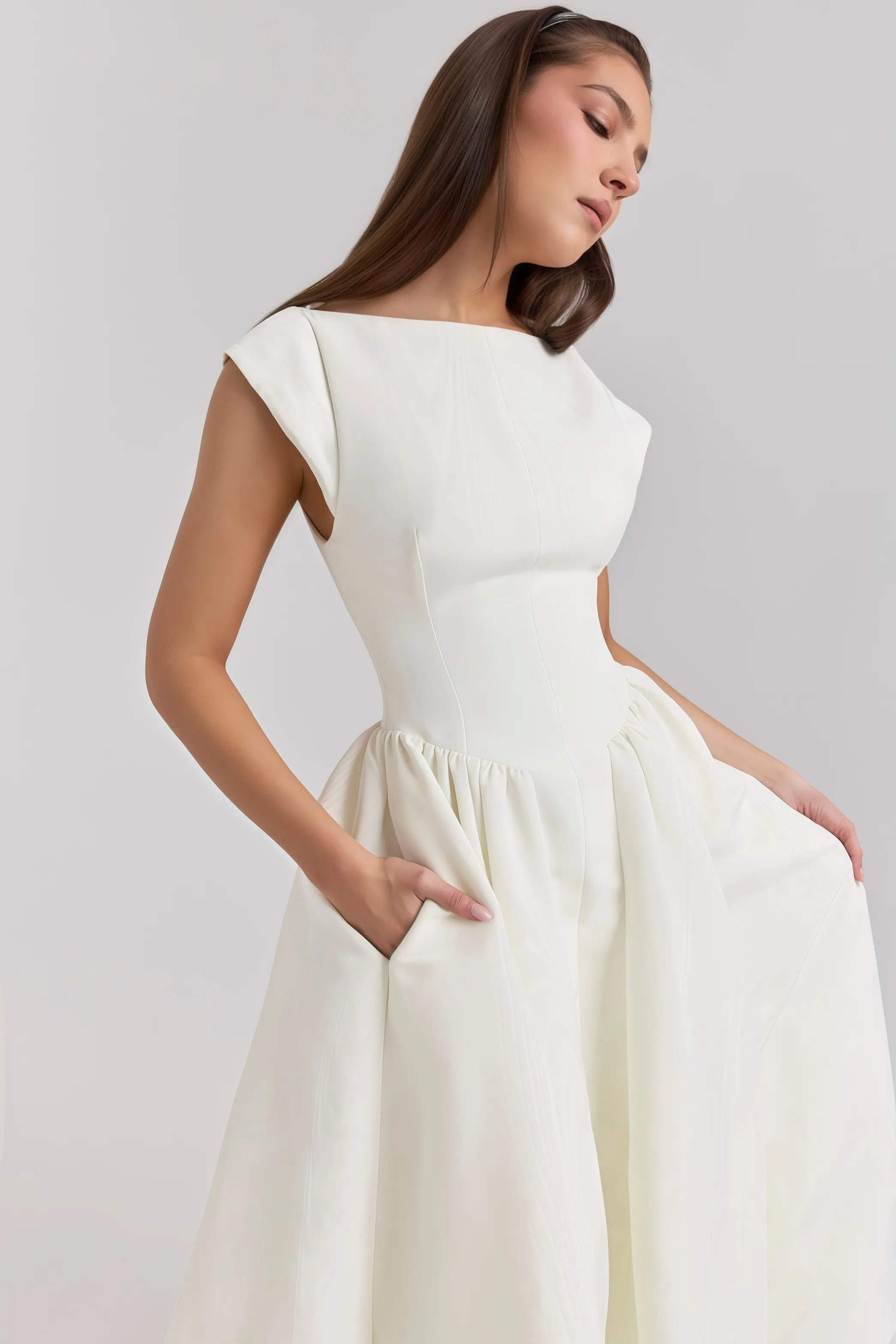 Elegant white midi dress with flared skirt