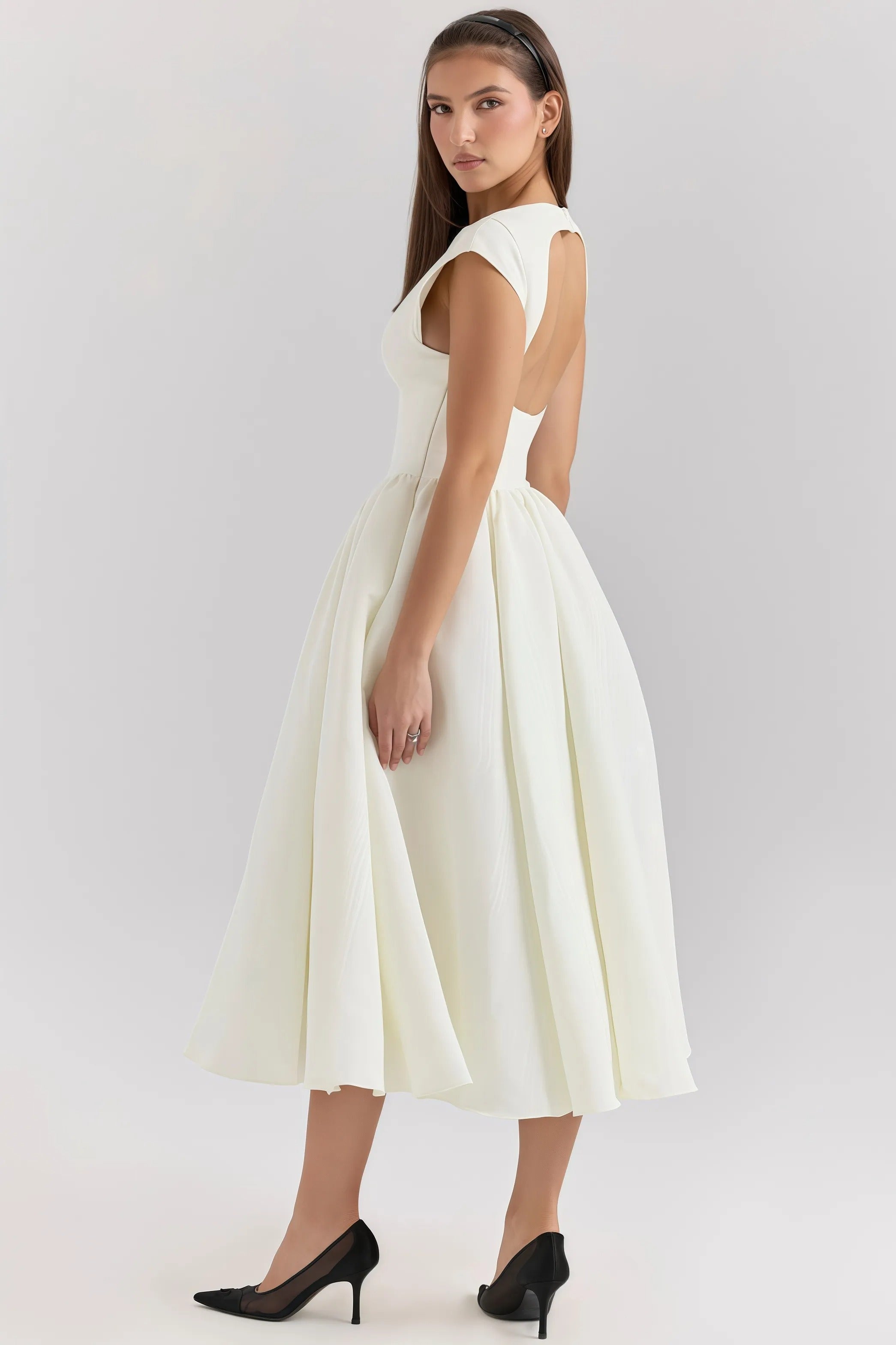 Elegant white midi dress with flared skirt